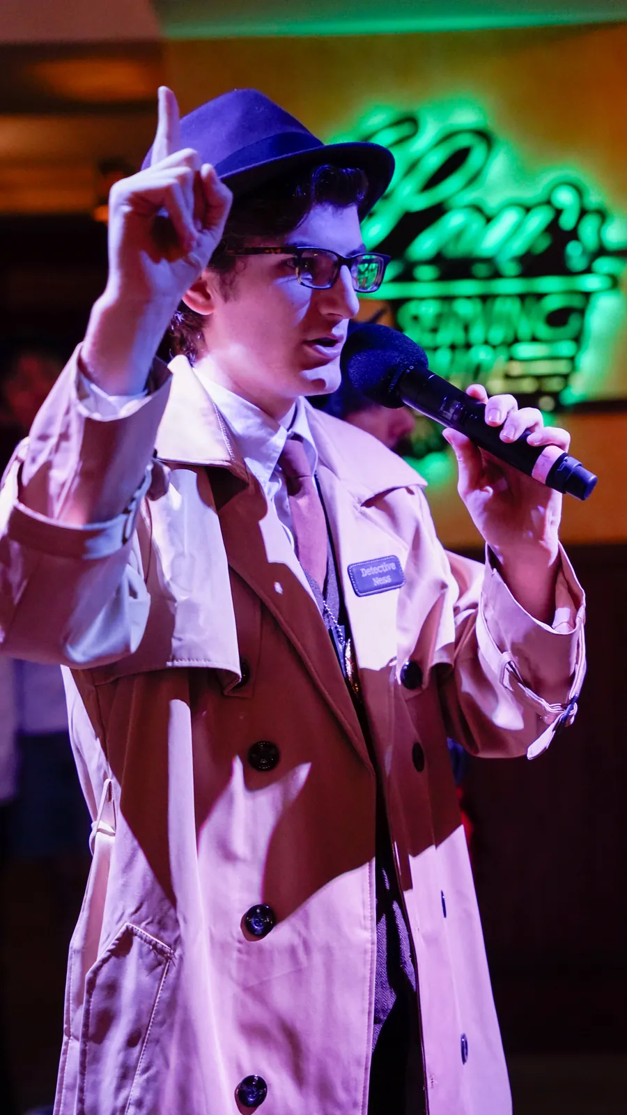 A Murder Mystery Company actor working the room at a Oakland show